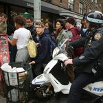 In a sharp contrast to the marches of early last week, when protestors were not discouraged by the NYPD to be in the streets blocking traffic, those taking part in the Hands Up Walk Out action were repeatedly ordered back onto sidewalks.<br>